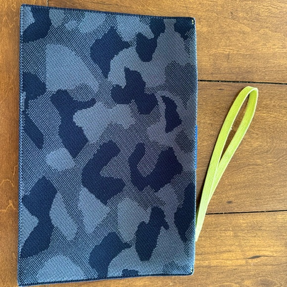 Rothy's Handbags - Rothy’s wristlet. Camo print in black and grey.